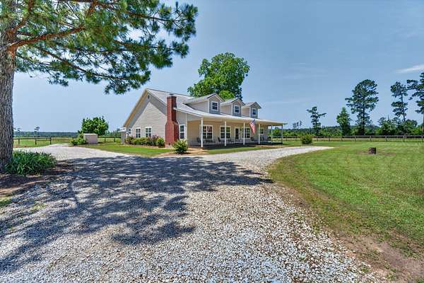 76 Acres of Recreational Land with Home for Sale in Votaw, Texas