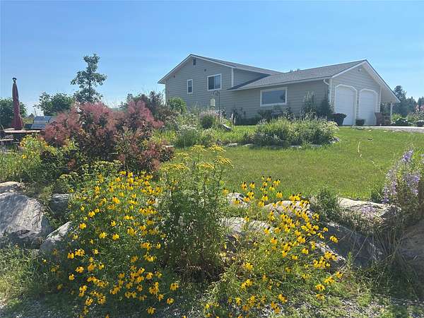 5 Acres of Land with Home for Sale in Kalispell, Montana