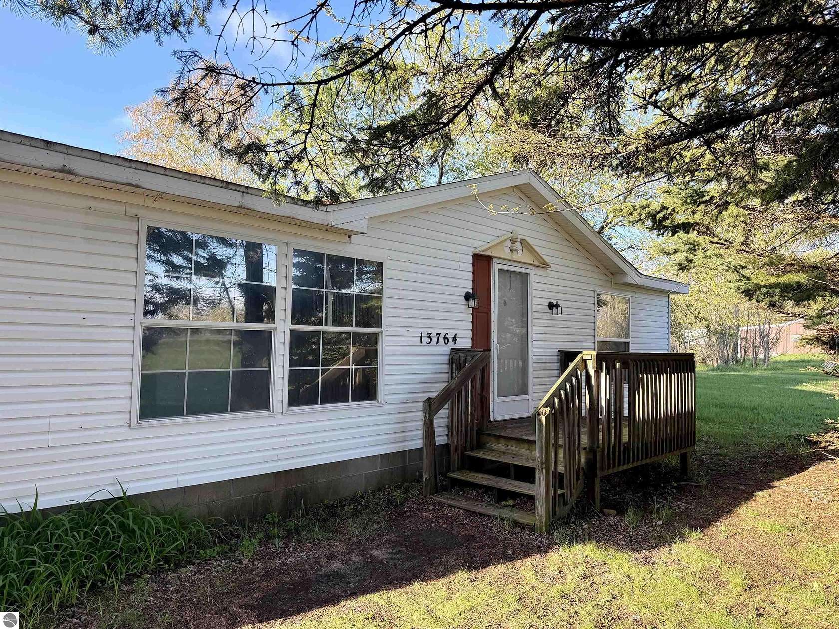 4 Acres of Land with Home for Sale in Kewadin, Michigan
