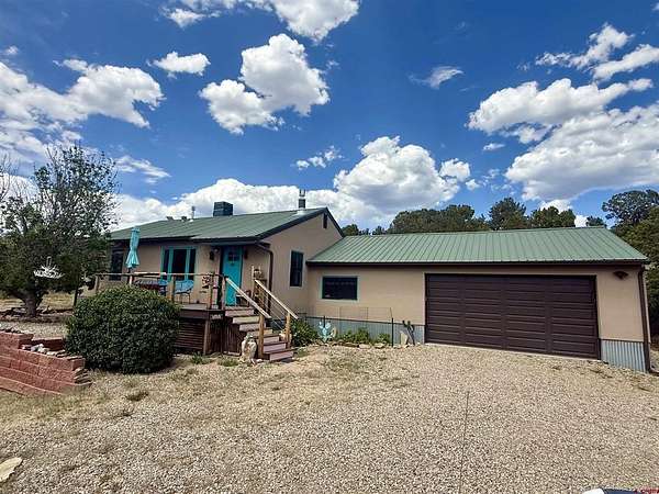 3.47 Acres of Land with Home for Sale in Mancos, Colorado