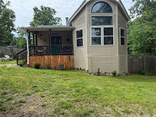 26.9 Acres of Recreational Land with Home for Sale in Edwards, Missouri