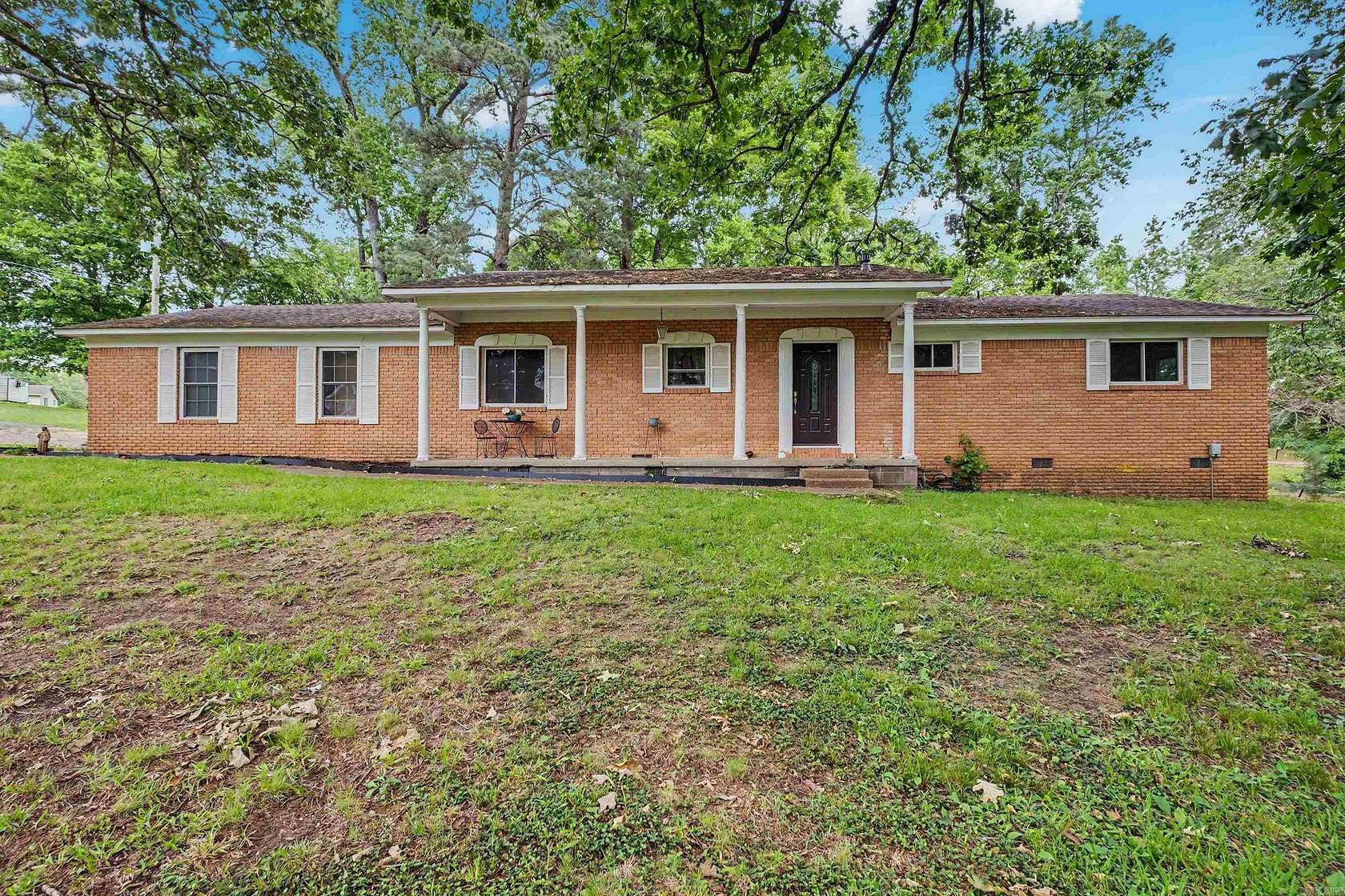 2.86 Acres of Land with Home for Sale in Benton, Arkansas