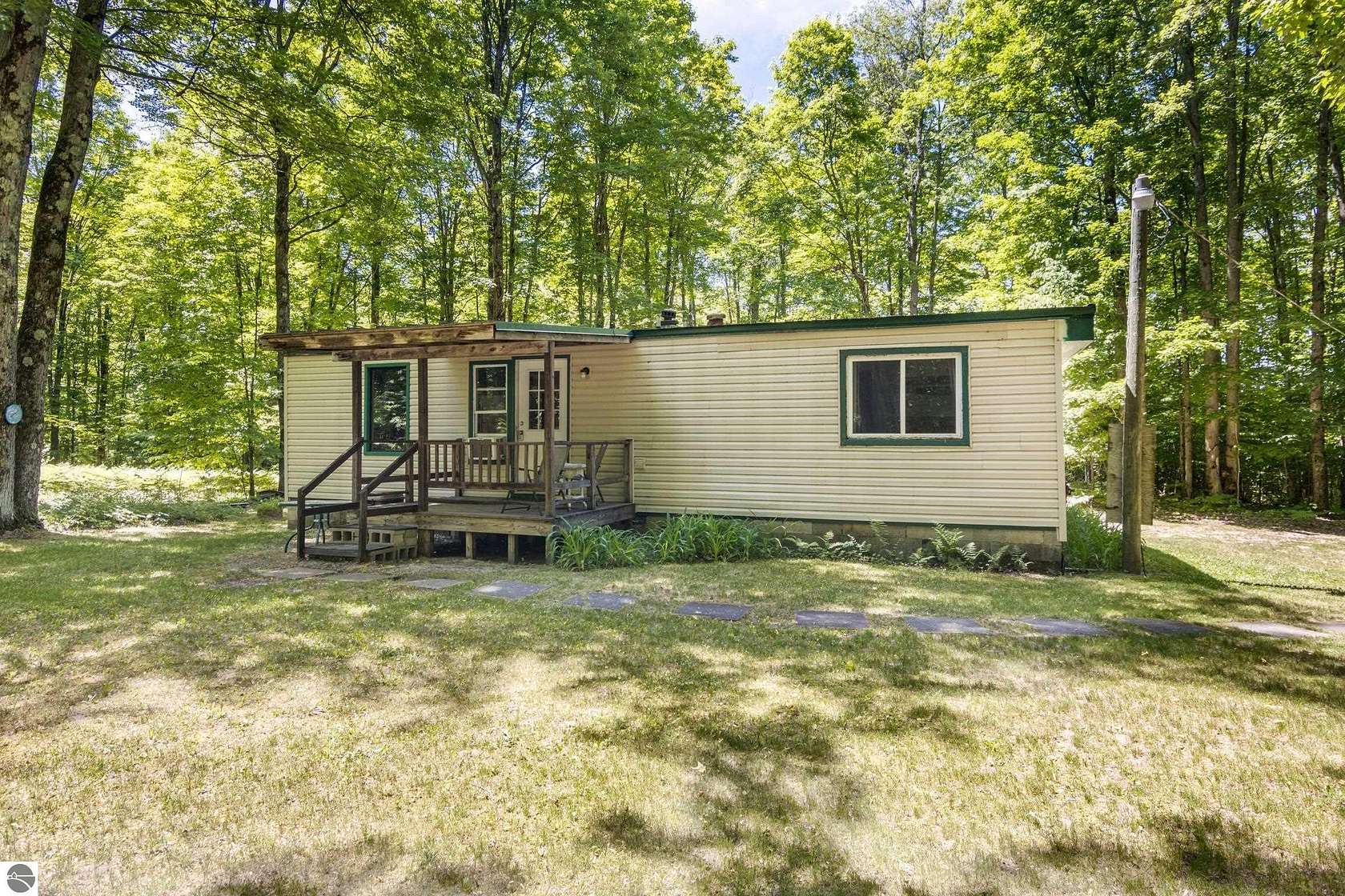 6.3 Acres of Land with Home for Sale in Mancelona, Michigan