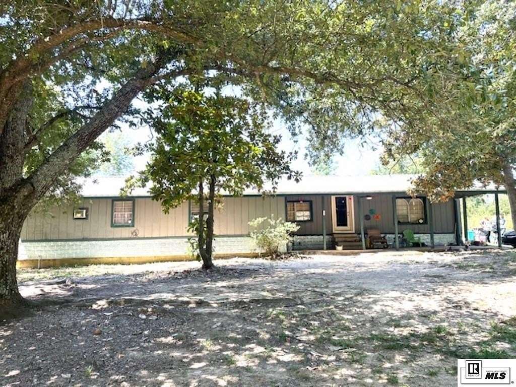 1.57 Acres of Land with Home for Sale in Grayson, Louisiana
