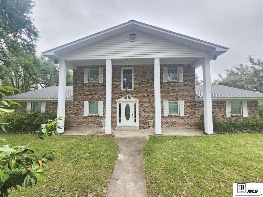 4 Acres of Land with Home for Sale in Oak Ridge, Louisiana