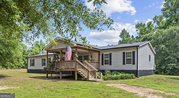 8.54 Acres of Land with Home for Sale in Comer, Georgia