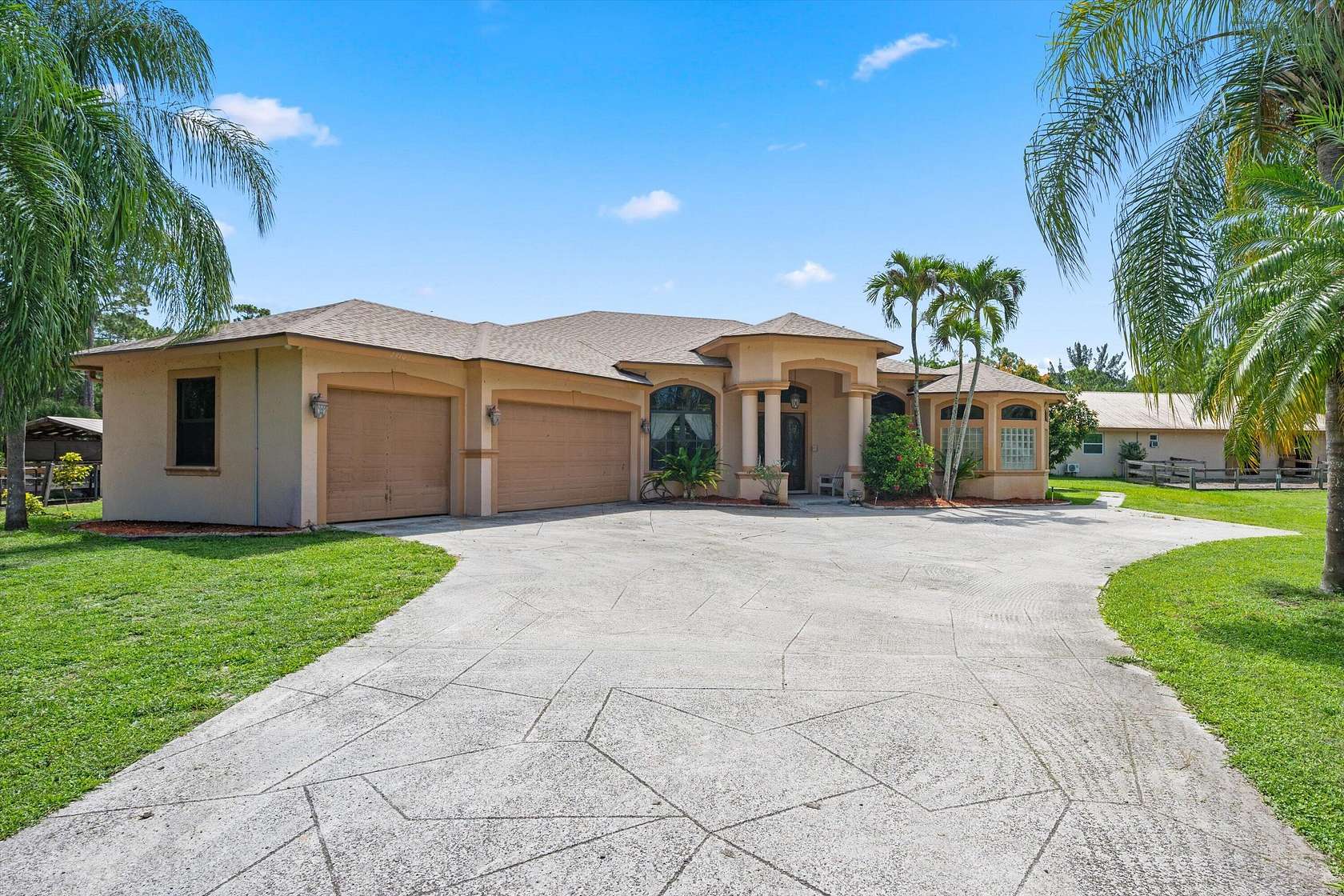 5 Acres of Land with Home for Sale in Loxahatchee Groves, Florida