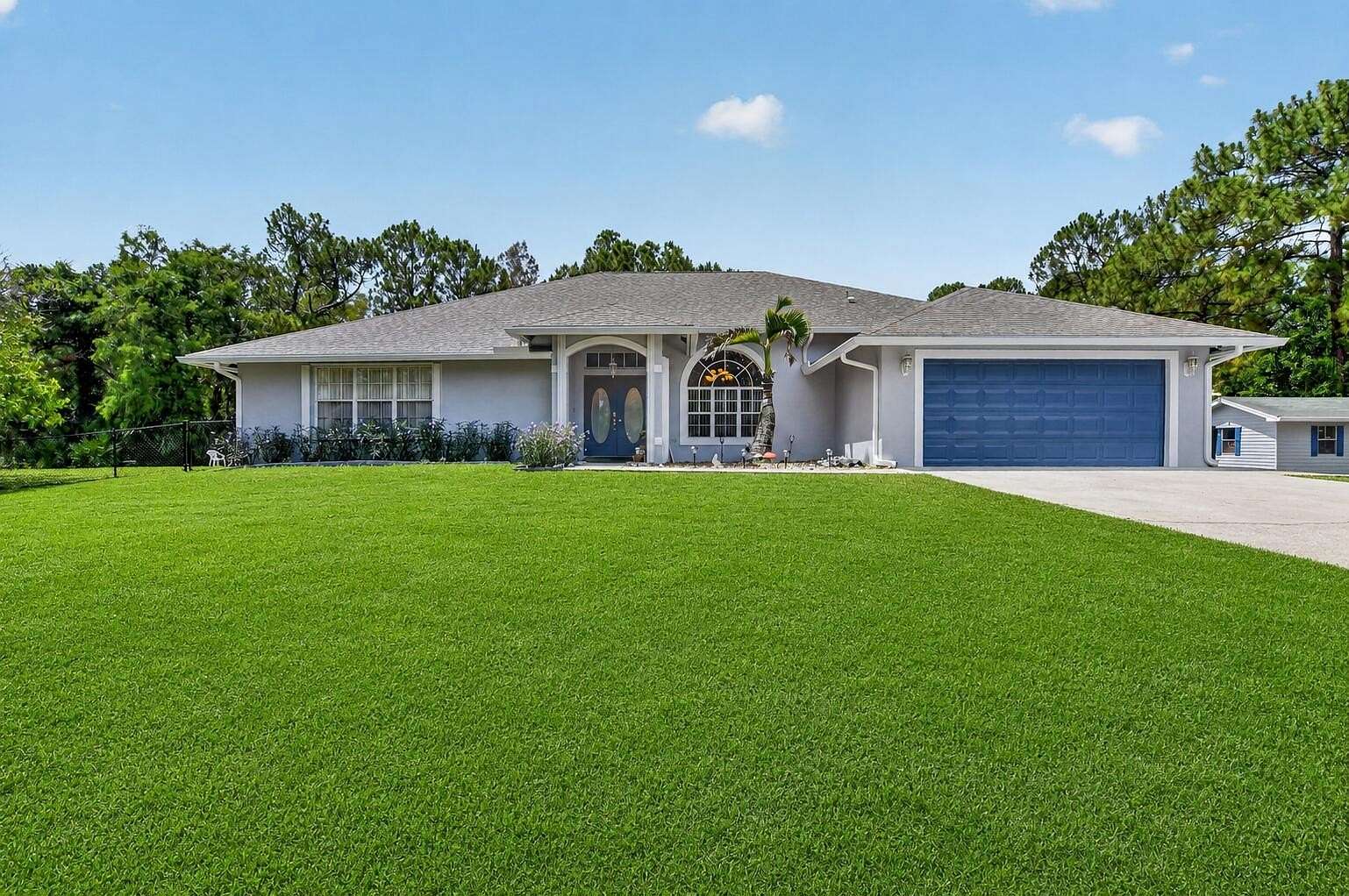 2.39 Acres of Land with Home for Sale in The Acreage, Florida