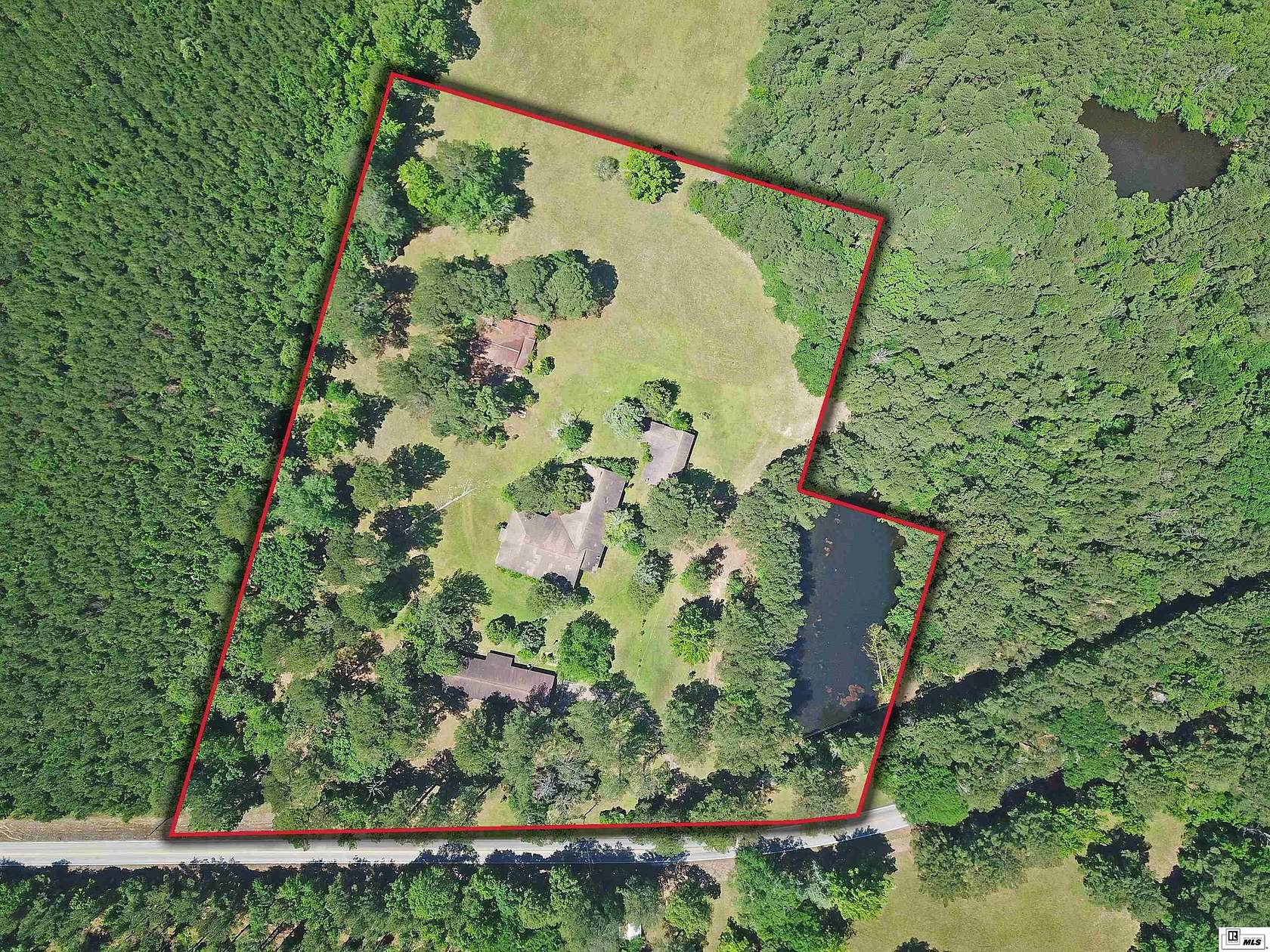 9.5 Acres of Land with Home for Sale in Columbia, Louisiana