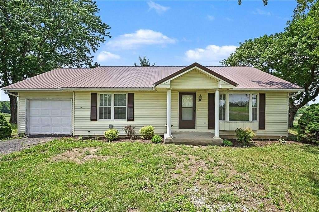 8.52 Acres of Land with Home for Sale in Stewartsville, Missouri