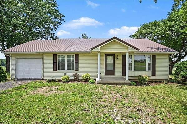8.52 Acres of Land with Home for Sale in Stewartsville, Missouri