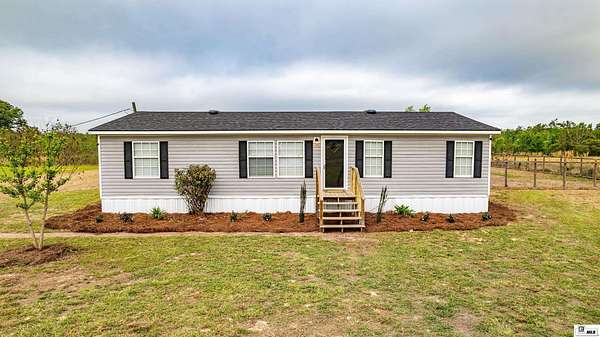 2.52 Acres of Land with Home for Sale in Swartz, Louisiana
