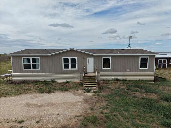 7.38 Acres of Land with Home for Sale in Merkel, Texas