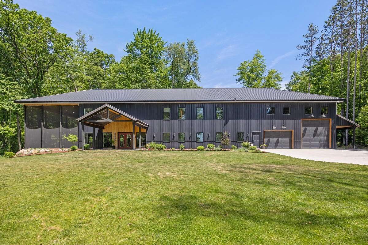 10 Acres of Recreational Land with Home for Sale in Rockford, Michigan