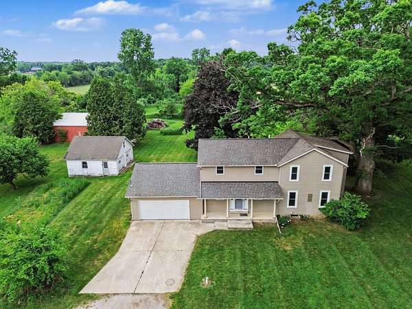 7.6 Acres of Land with Home for Sale in Chelsea, Michigan