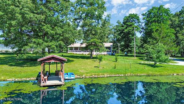 9 Acres of Land with Home for Sale in Lancing, Tennessee
