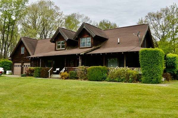 83 Acres of Land with Home for Auction in Horton, Michigan