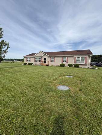 6.88 Acres of Land with Home for Sale in De Graff, Ohio