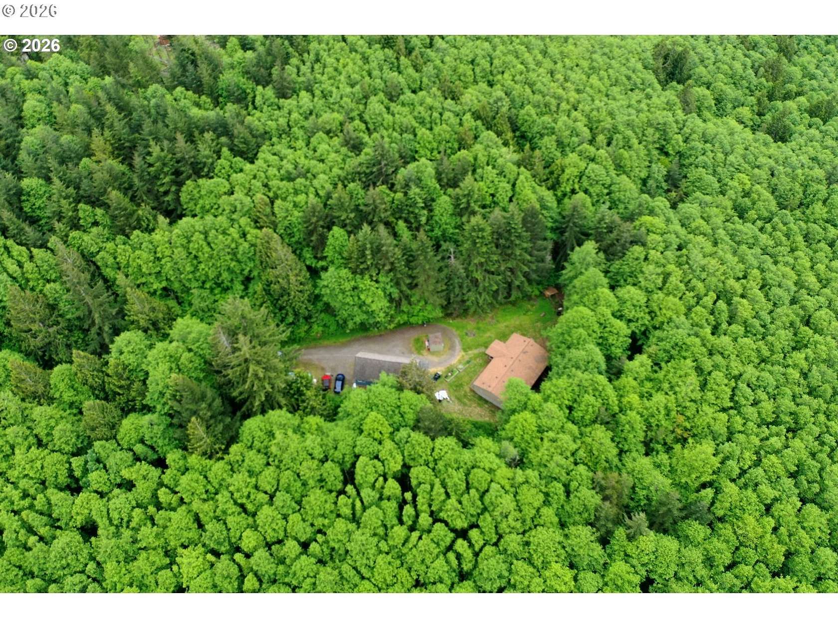 12.3 Acres of Land with Home for Sale in Rainier, Oregon