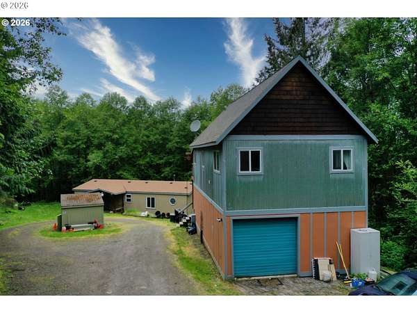 12.3 Acres of Land with Home for Sale in Rainier, Oregon