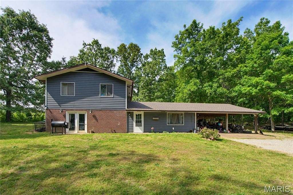 7.5 Acres of Land with Home for Sale in Doniphan, Missouri