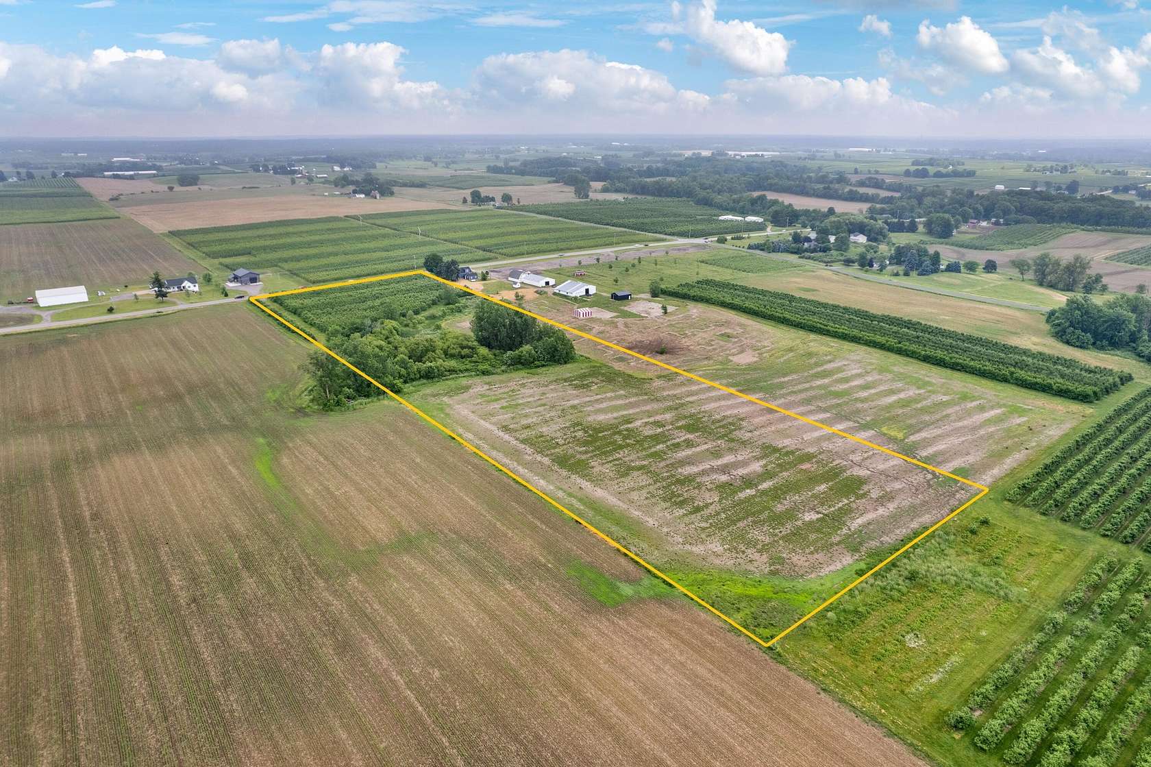 10.6 Acres of Land for Sale in Sparta, Michigan