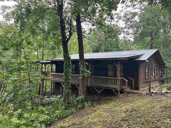 5.64 Acres of Land with Home for Sale in Savannah, Tennessee