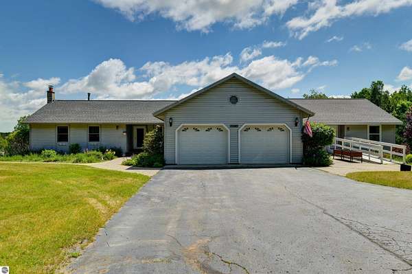 10 Acres of Improved Mixed-Use Land for Sale in Kingsley, Michigan