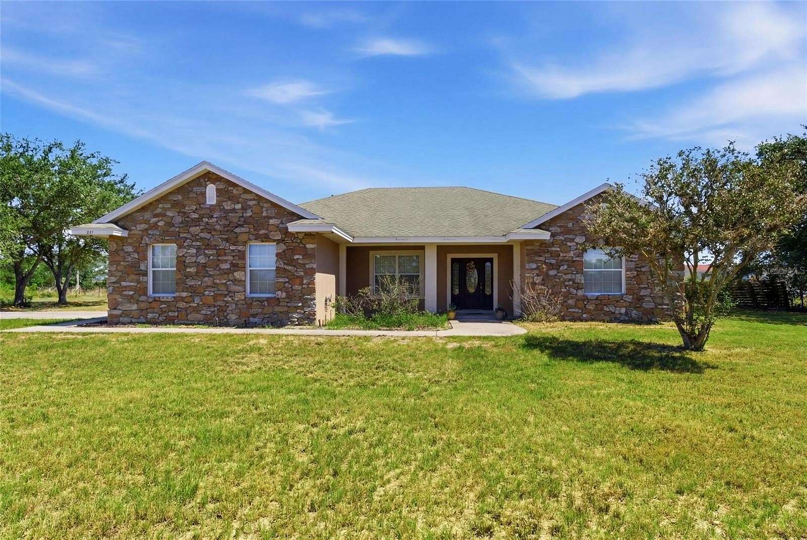 2.44 Acres of Land with Home for Sale in Babson Park, Florida