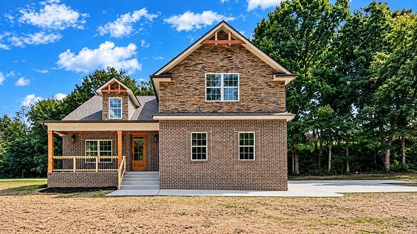 1.84 Acres of Land with Home for Sale in Cumberland Furnace, Tennessee