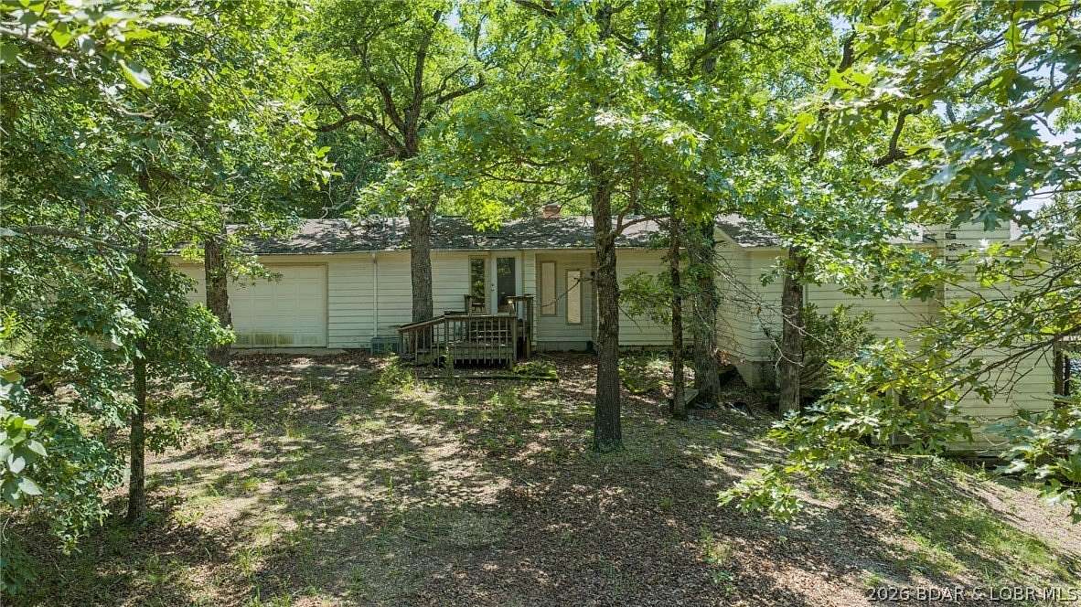 75.8 Acres of Recreational Land with Home for Sale in Sunrise Beach, Missouri