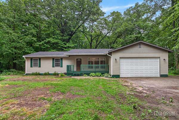 1.5 Acres of Land with Home for Sale in Twin Lake, Michigan