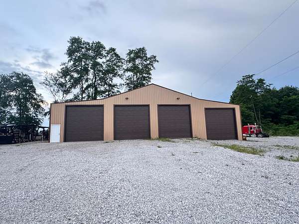 1.55 Acres of Improved Commercial Land for Sale in Clarkrange, Tennessee