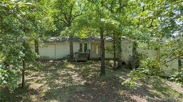 3.8 Acres of Land with Home for Sale in Sunrise Beach, Missouri