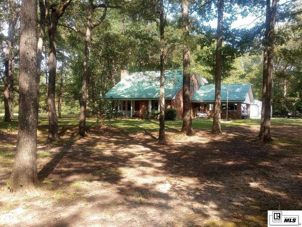 3.6 Acres of Land with Home for Sale in Bastrop, Louisiana