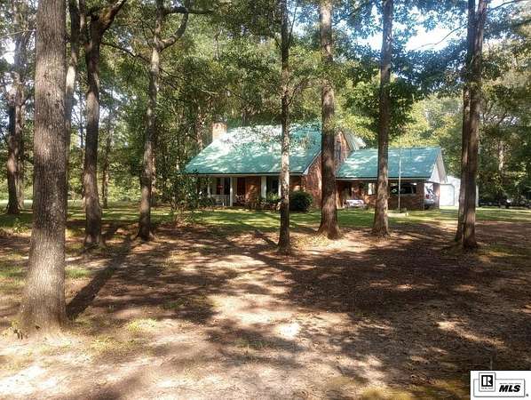 3.6 Acres of Land with Home for Sale in Bastrop, Louisiana