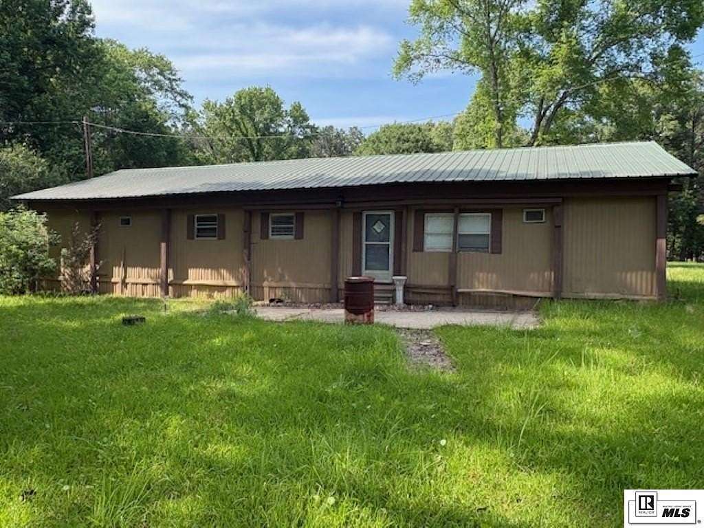 2.85 Acres of Land with Home for Sale in Bastrop, Louisiana
