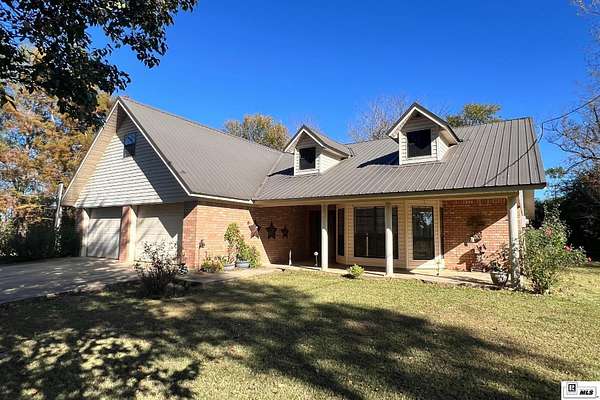 1.76 Acres of Land with Home for Sale in Oak Grove, Louisiana