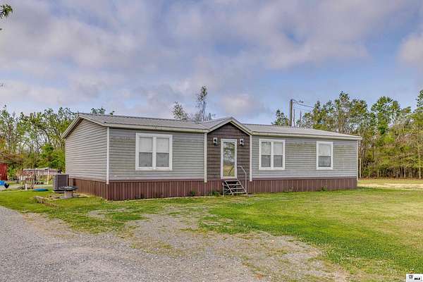 4.65 Acres of Land with Home for Sale in Rayville, Louisiana