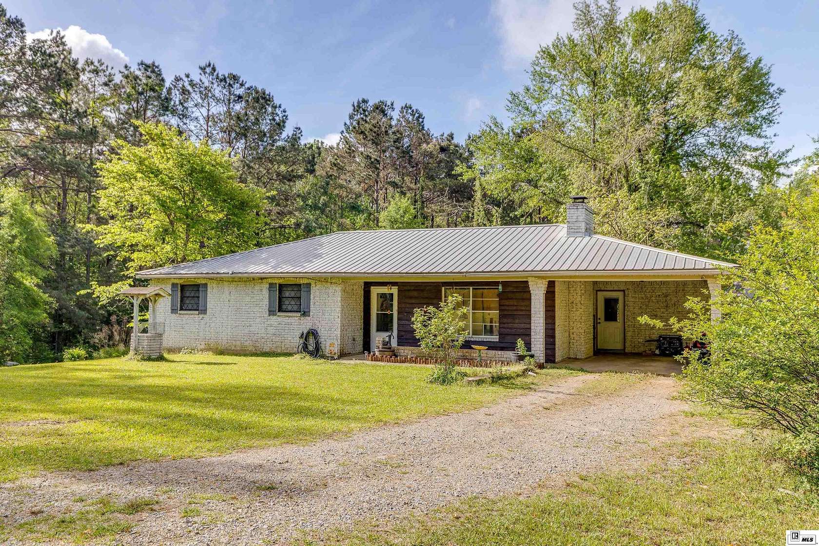 20.3 Acres of Land with Home for Sale in Eros, Louisiana