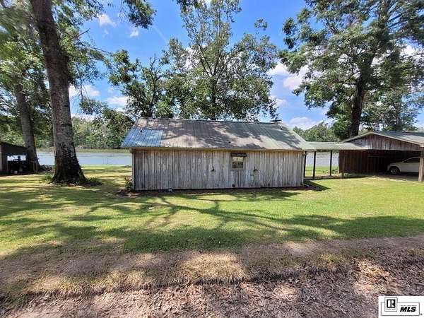 3 Acres of Land with Home for Sale in Oak Ridge, Louisiana