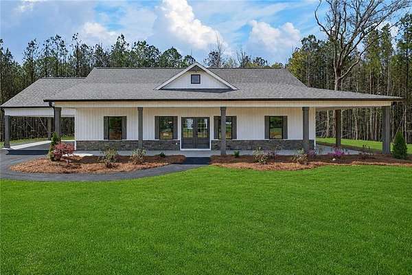23.4 Acres of Land with Home for Sale in Rockmart, Georgia