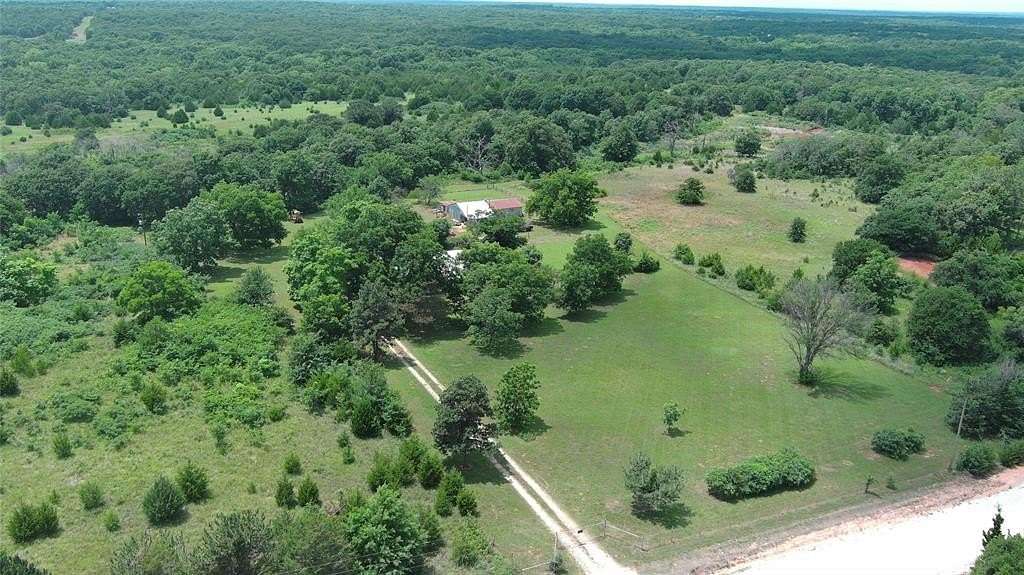 56 Acres of Agricultural Land with Home for Sale in Wanette, Oklahoma