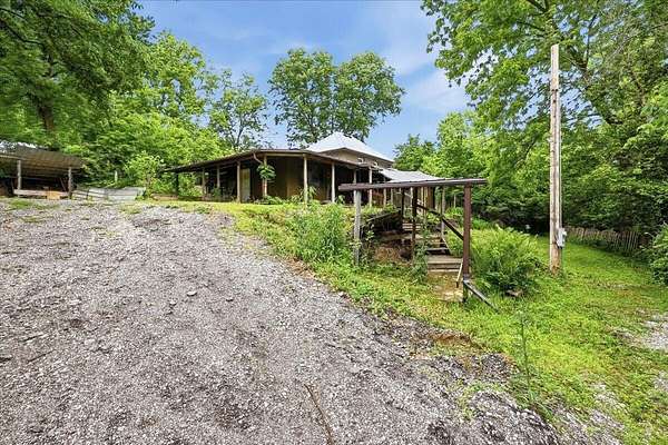 11.6 Acres of Land with Home for Sale in Council Bluffs, Iowa