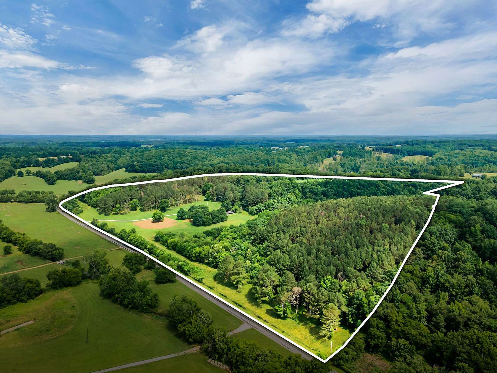 61 Acres of Land for Auction in Minor Hill, Tennessee