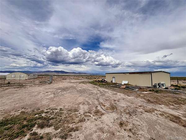 57 Acres of Land with Home for Sale in Saguache, Colorado