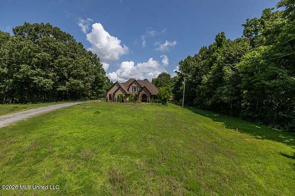 20.7 Acres of Recreational Land with Home for Sale in Coldwater, Mississippi