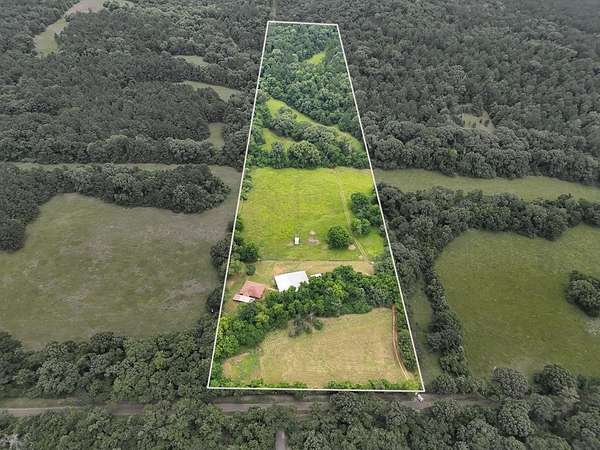 19.8 Acres of Land with Home for Sale in Palestine, Texas