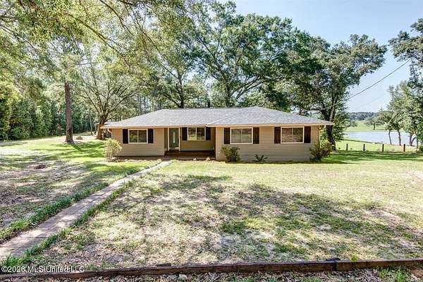 1.5 Acres of Land with Home for Sale in Carriere, Mississippi