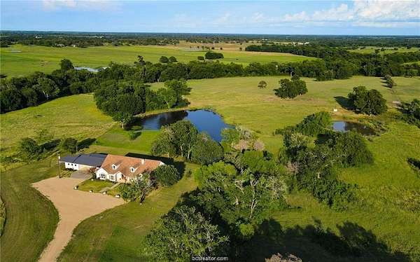 25.4 Acres of Recreational Land with Home for Sale in Caldwell, Texas